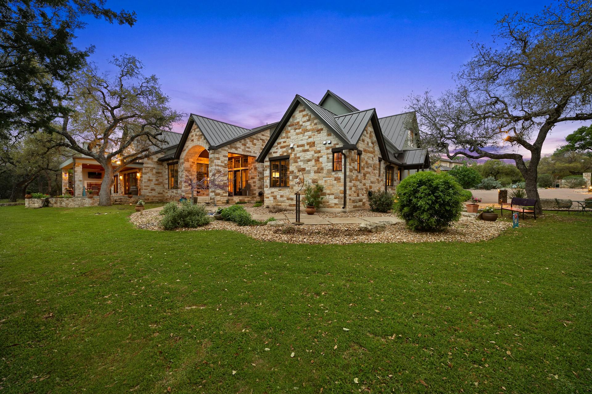 1330 Ranchers Club Lane Driftwood, TX 78619 - Photo 39 of 40 a front view of a house with garden
