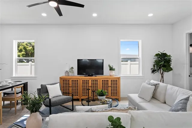 a kitchen with counter top space appliances and a center island