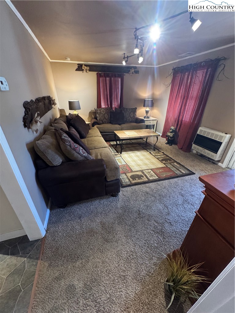 84 Avery High School Road Newland, NC 28657 - Photo 14 of 29 a living room with furniture