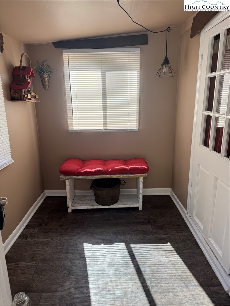 84 Avery High School Road Newland, NC 28657 - Photo 3 of 29 a bedroom with a bed and a book shelf
