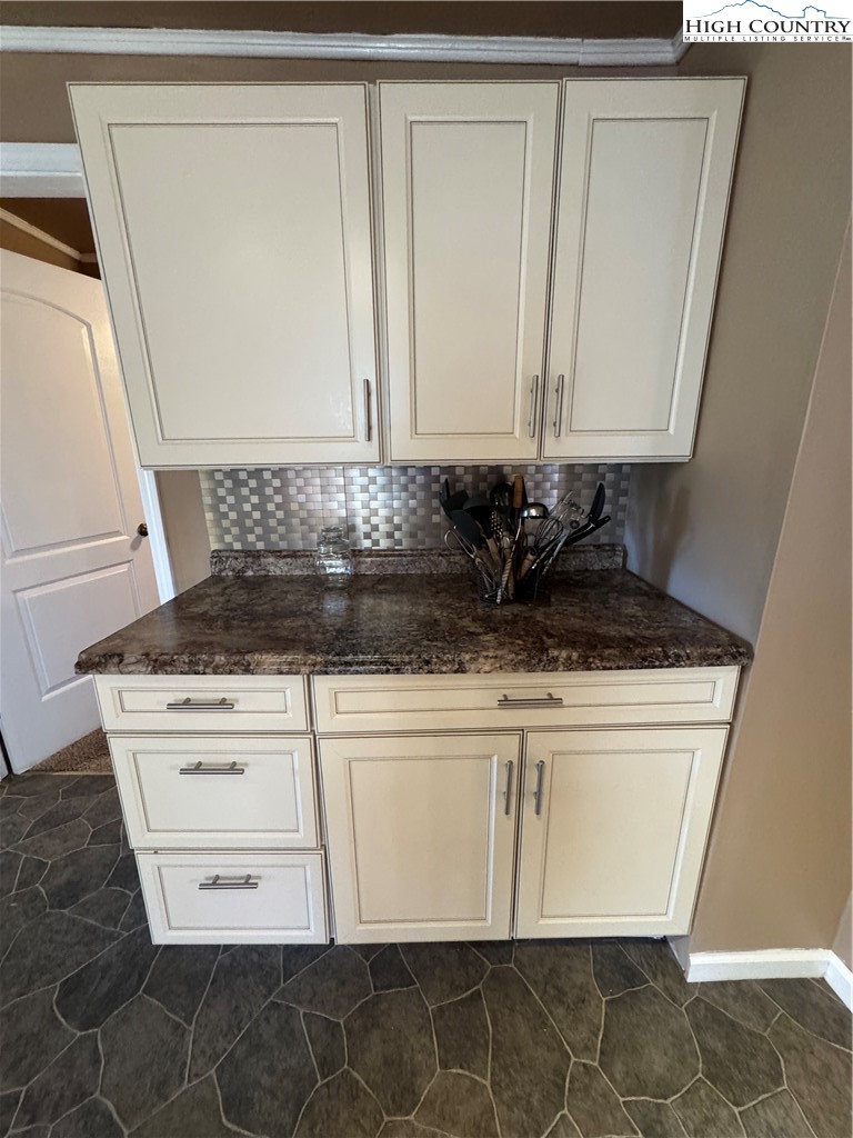 84 Avery High School Road Newland, NC 28657 - Photo 6 of 29 a close view of a sink a mirror and a vanity