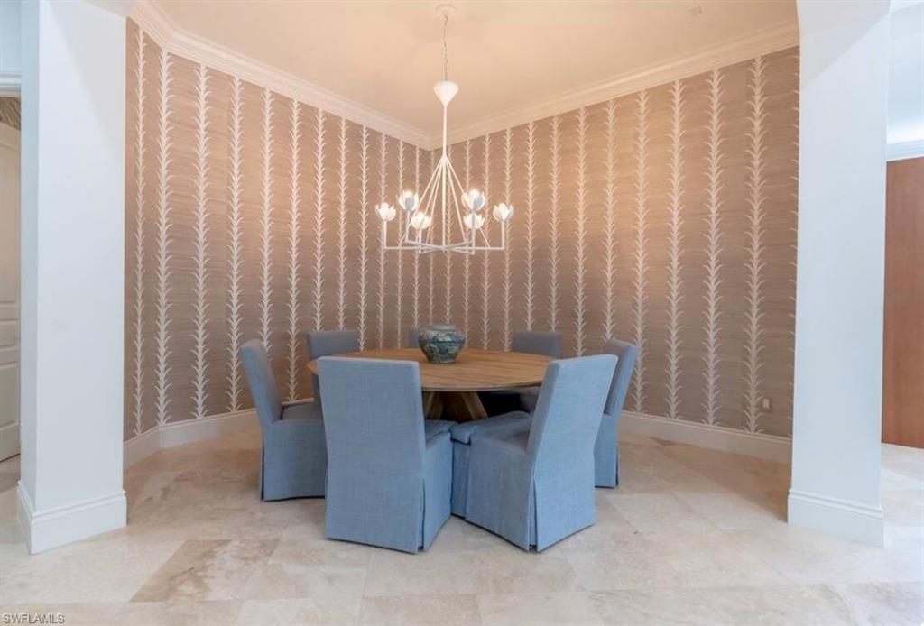 428 Rudder Road Naples, FL 34102 - Photo 12 of 49 a view of a room with furniture and a window