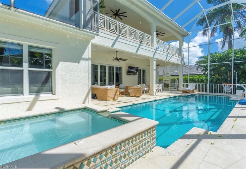 428 Rudder Road Naples, FL 34102 - Photo 19 of 49 a view of a house with a backyard