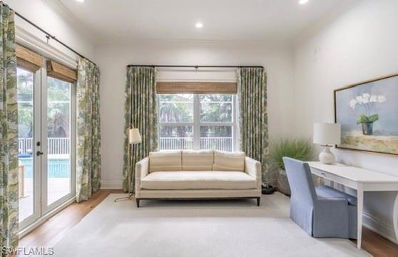 428 Rudder Road Naples, FL 34102 - Photo 24 of 49 a living room with furniture and a large window