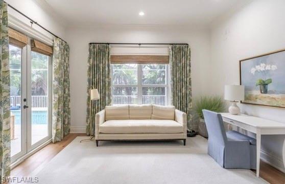 428 Rudder Road Naples, FL 34102 - Photo 26 of 49 a living room with furniture and a large window