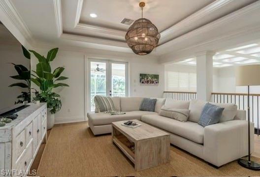 428 Rudder Road Naples, FL 34102 - Photo 32 of 49 a living room with furniture and a large window