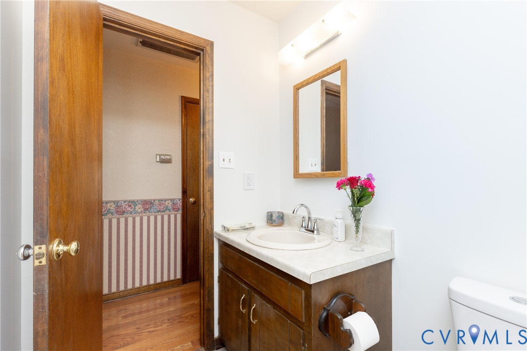617 Rebel Ridge Road Colonial Heights, VA 23834 - Photo 29 of 49 a bathroom with a sink vanity and a mirror