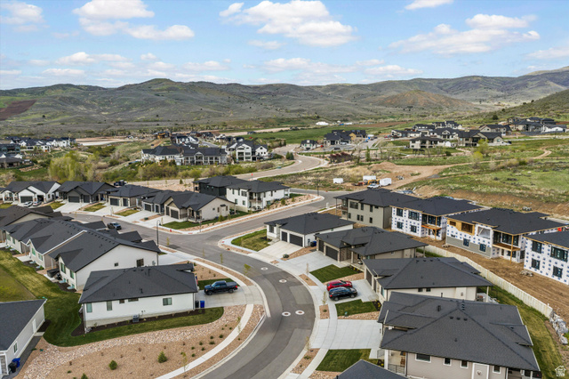 3349 Oxford Loop Morgan, UT 84050 - Photo 44 of 47 Aerial view of residential area with a mountain backdrop