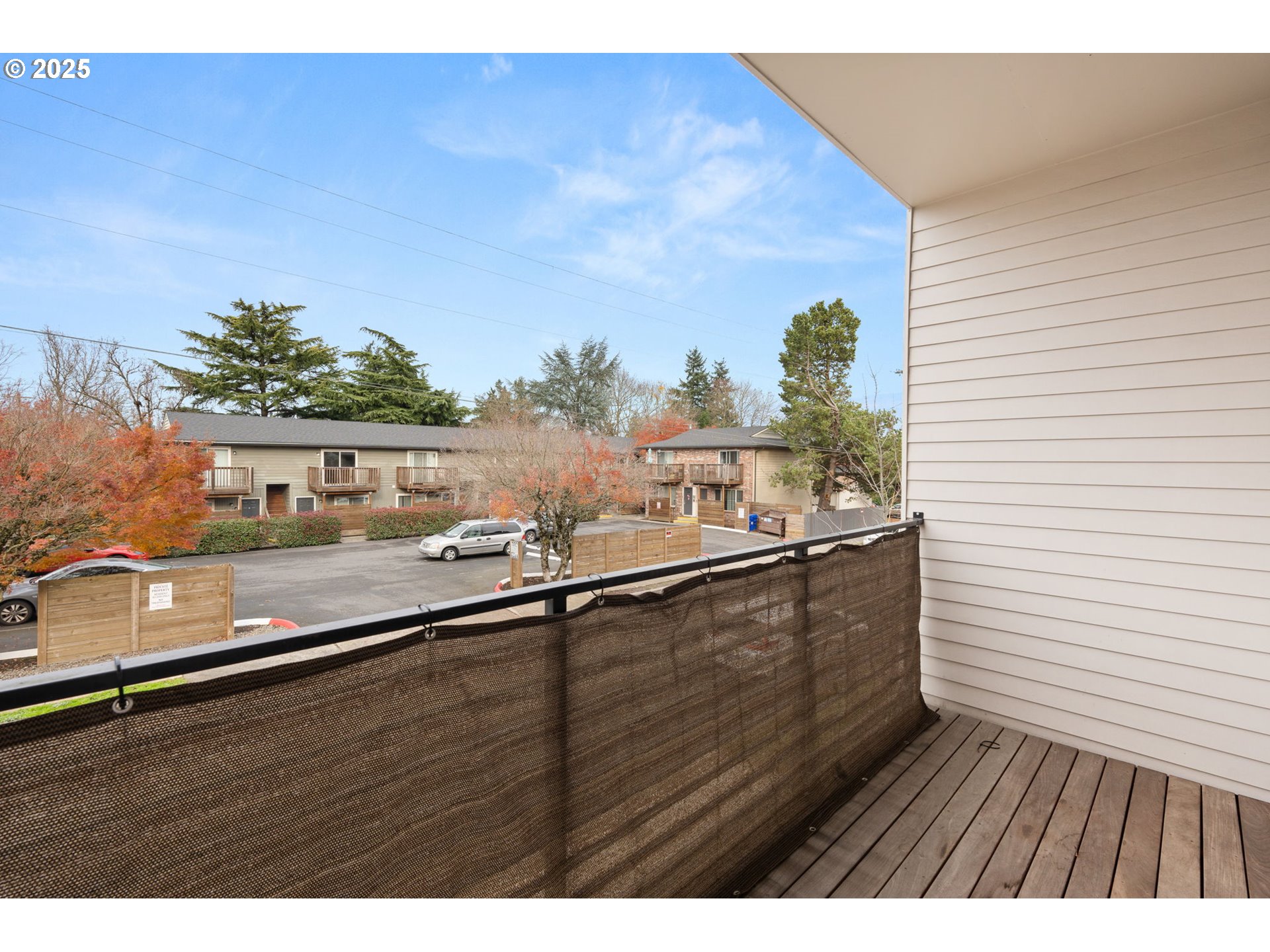 7204 Southeast Steele Street Portland, OR 97206 - Photo 14 of 37 a view of balcony with wooden floor