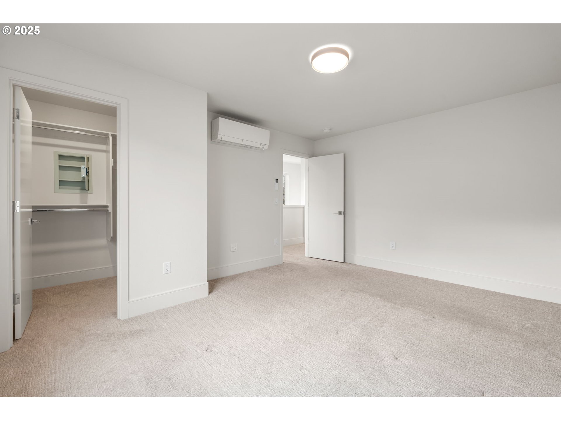 7204 Southeast Steele Street Portland, OR 97206 - Photo 17 of 37 a view of an empty room with closet and a window