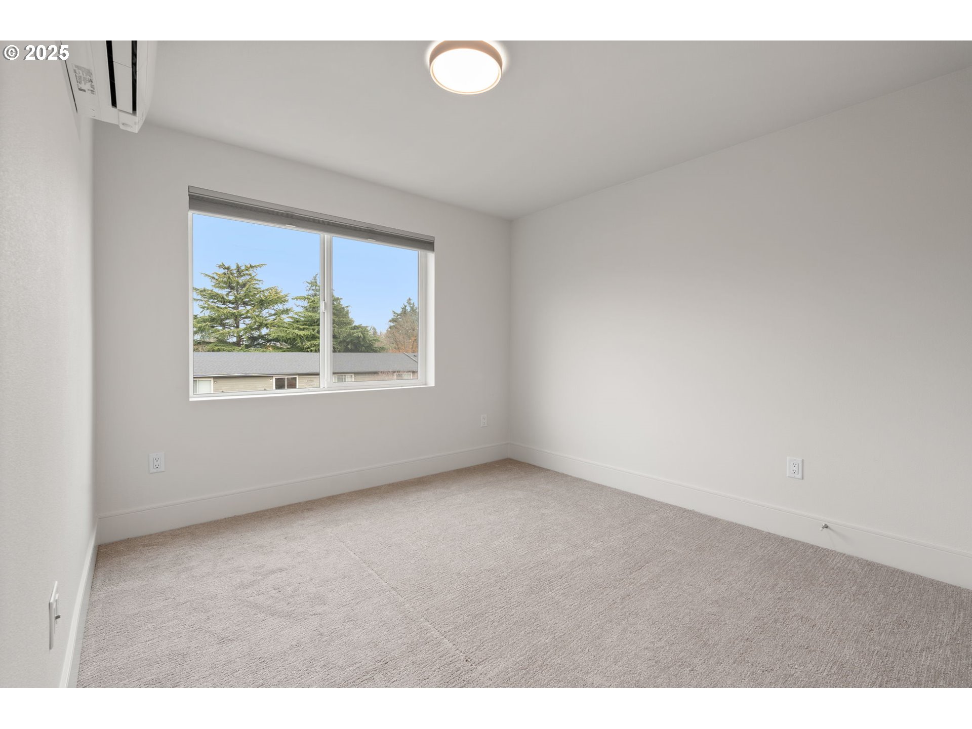 7204 Southeast Steele Street Portland, OR 97206 - Photo 22 of 37 a view of an empty room with a window