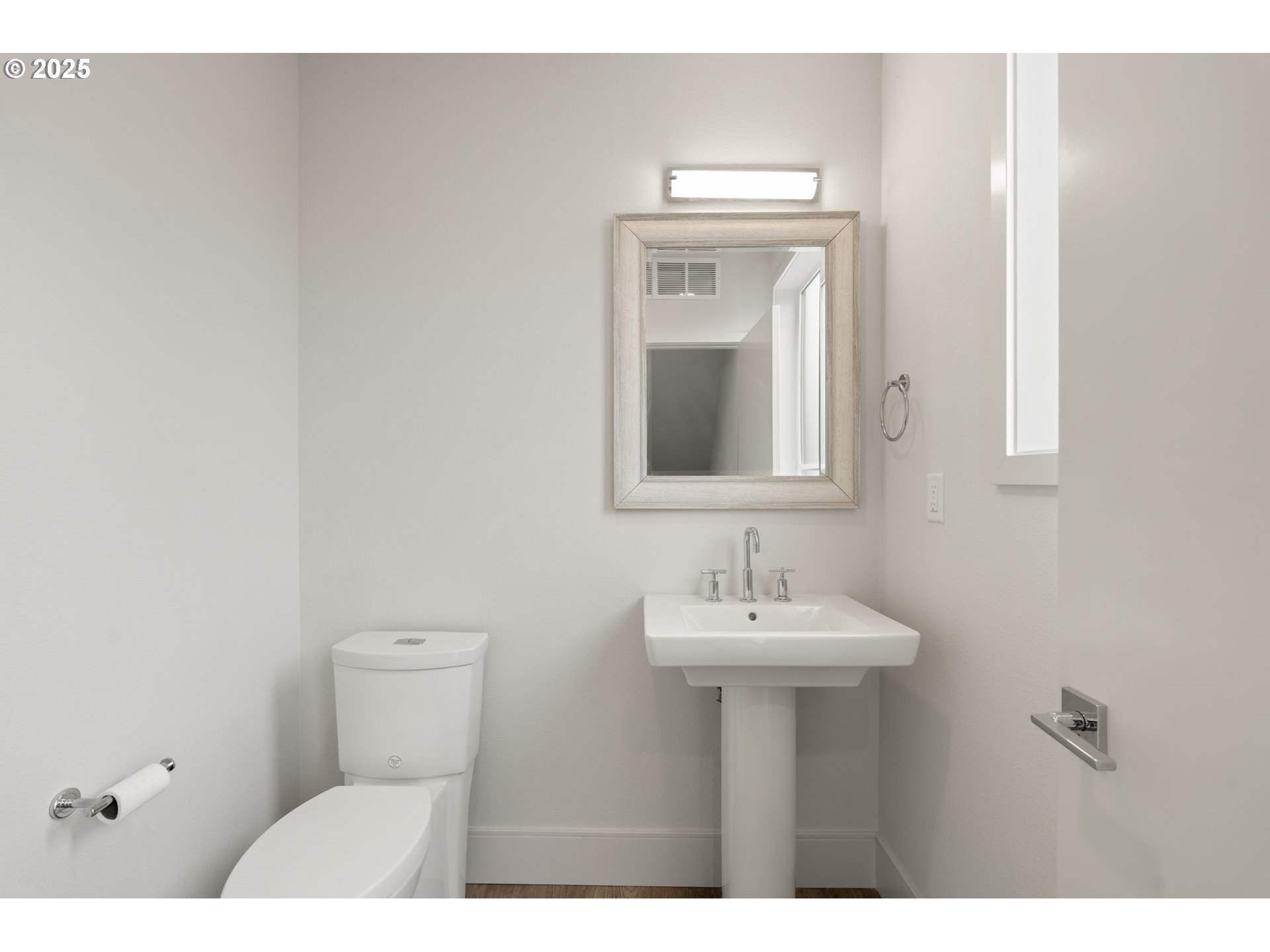 7204 Southeast Steele Street Portland, OR 97206 - Photo 26 of 37 a bathroom with a toilet sink and mirror