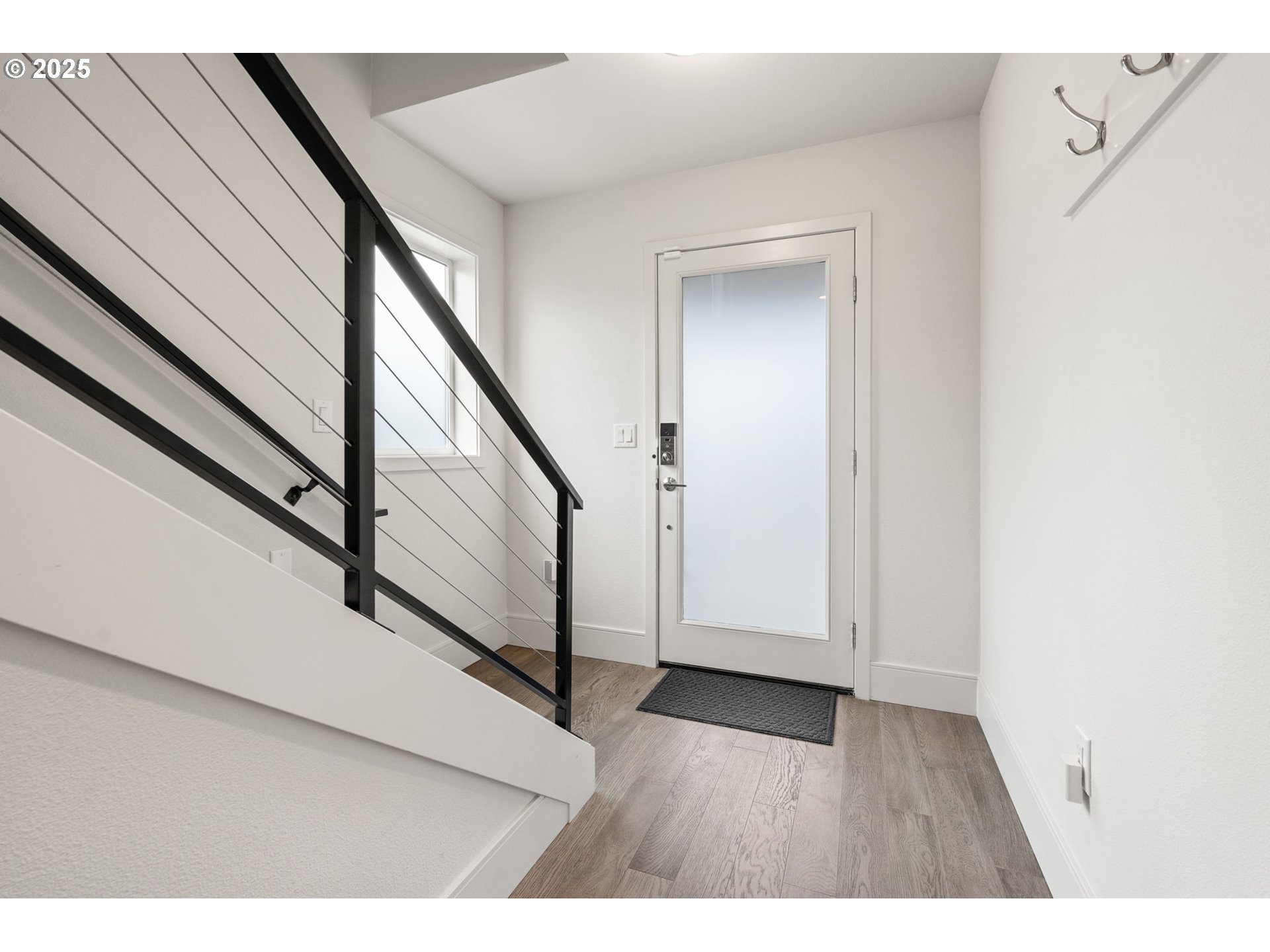 7204 Southeast Steele Street Portland, OR 97206 - Photo 4 of 37 a view of an entryway with wooden floor