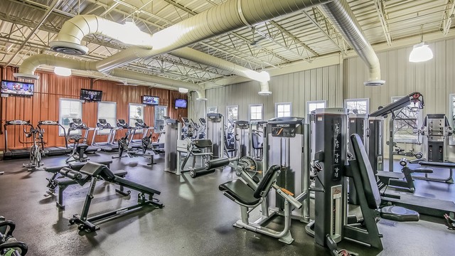 2472 Bella Drive, Unit 2575 Pingree Grove, IL 60140 - Photo 24 of 29 a view of a room with gym equipment