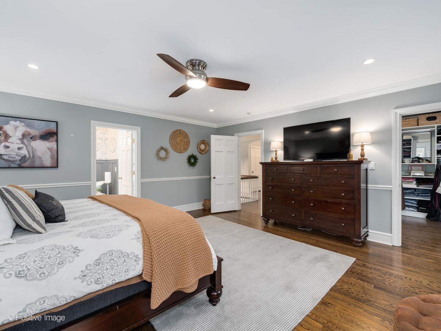 205 Scott Avenue Winnetka, IL 60093 - Photo 22 of 58 a bedroom with a large bed and a flat screen tv