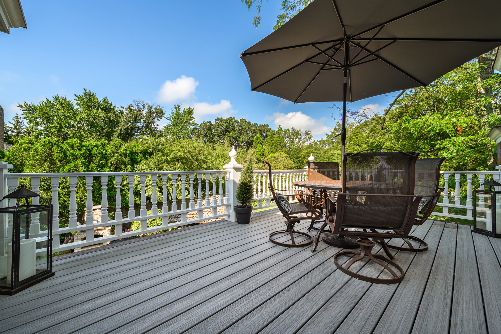 205 Scott Avenue Winnetka, IL 60093 - Photo 51 of 58 a view of a deck with furniture and umbrella