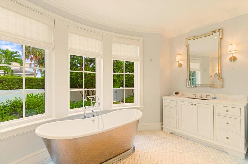 300 Indian Road Palm Beach, FL 33480 - Photo 15 of 17 a bathroom with a granite countertop tub sink and mirror