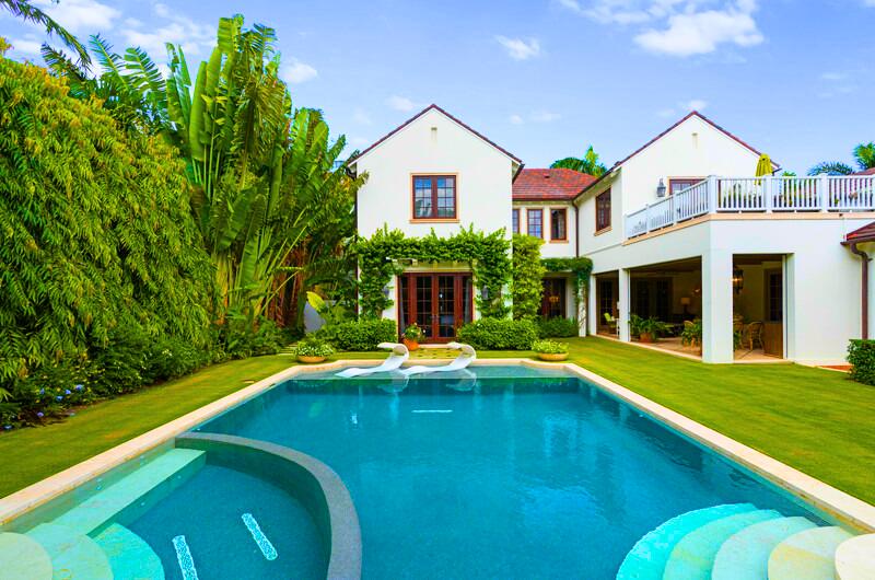 300 Indian Road Palm Beach, FL 33480 - Photo 3 of 17 a view of an house with swimming pool and porch