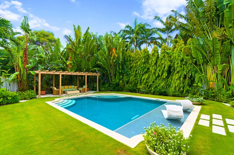 300 Indian Road Palm Beach, FL 33480 - Photo 4 of 17 a view of a backyard with swimming pool