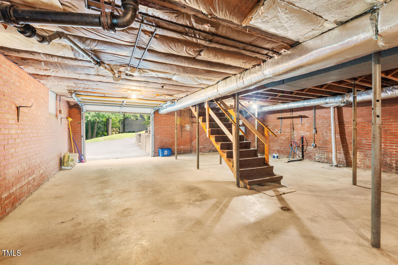 3203 Cole Mill Road Durham, NC 27705 - Photo 24 of 32 Basement with 1-car Garage Space