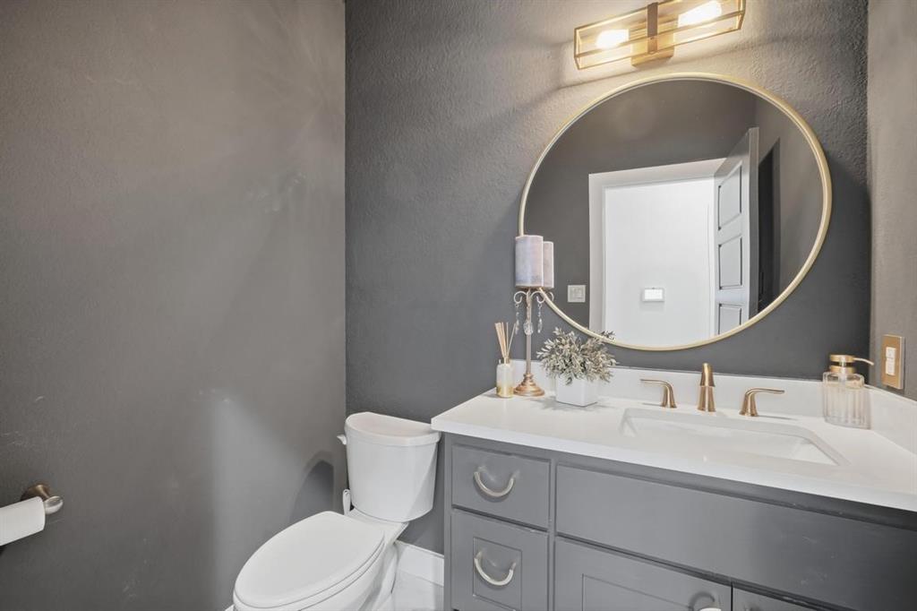 136 Mistletoe Ridge Lawn, TX 79530 - Photo 22 of 37 Half bath with vanity and a textured wall