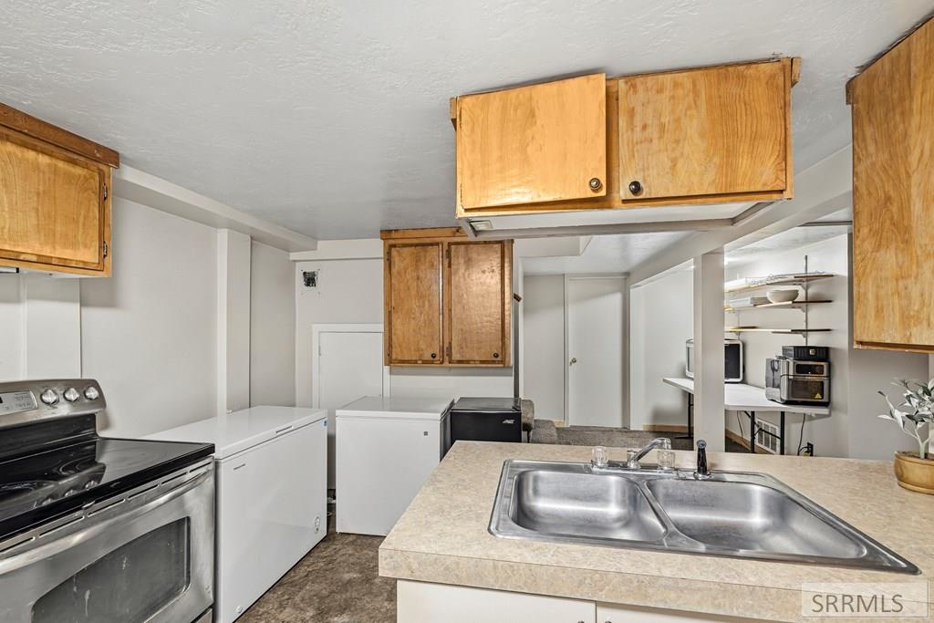 149 East Main Street St. Anthony, ID 83445 - Photo 28 of 33 Basement Kitchen
