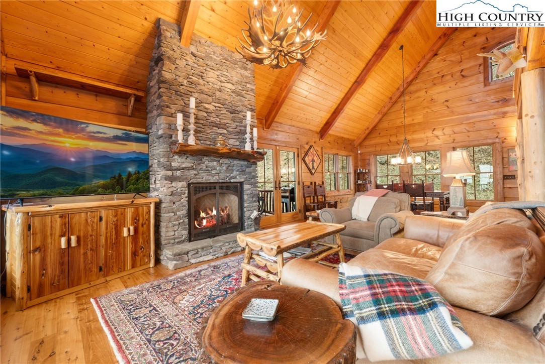 635 Acorn Road Zionville, NC 28698 - Photo 11 of 50 a living room with furniture and a fireplace