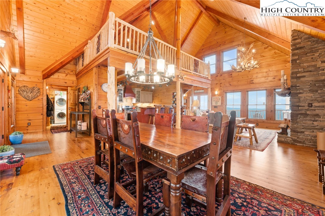 635 Acorn Road Zionville, NC 28698 - Photo 13 of 50 a dining room with furniture and wooden floor