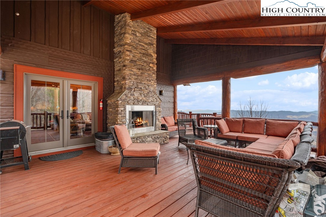 635 Acorn Road Zionville, NC 28698 - Photo 19 of 50 a outdoor living space with furniture and a fireplace