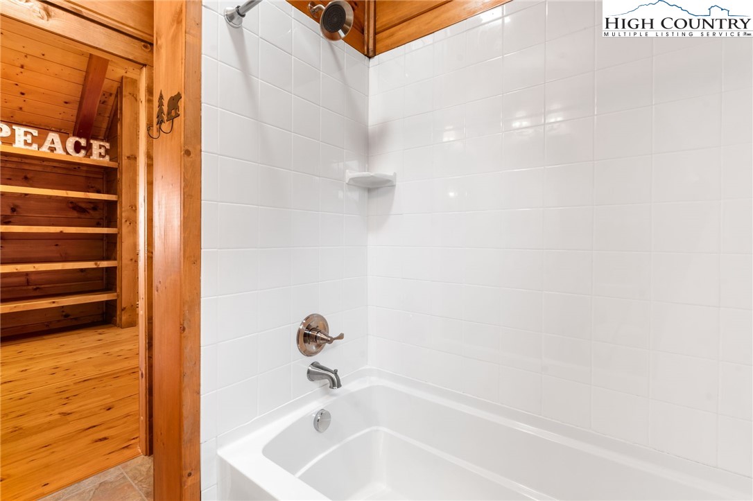 635 Acorn Road Zionville, NC 28698 - Photo 36 of 50 a bathroom with a tub