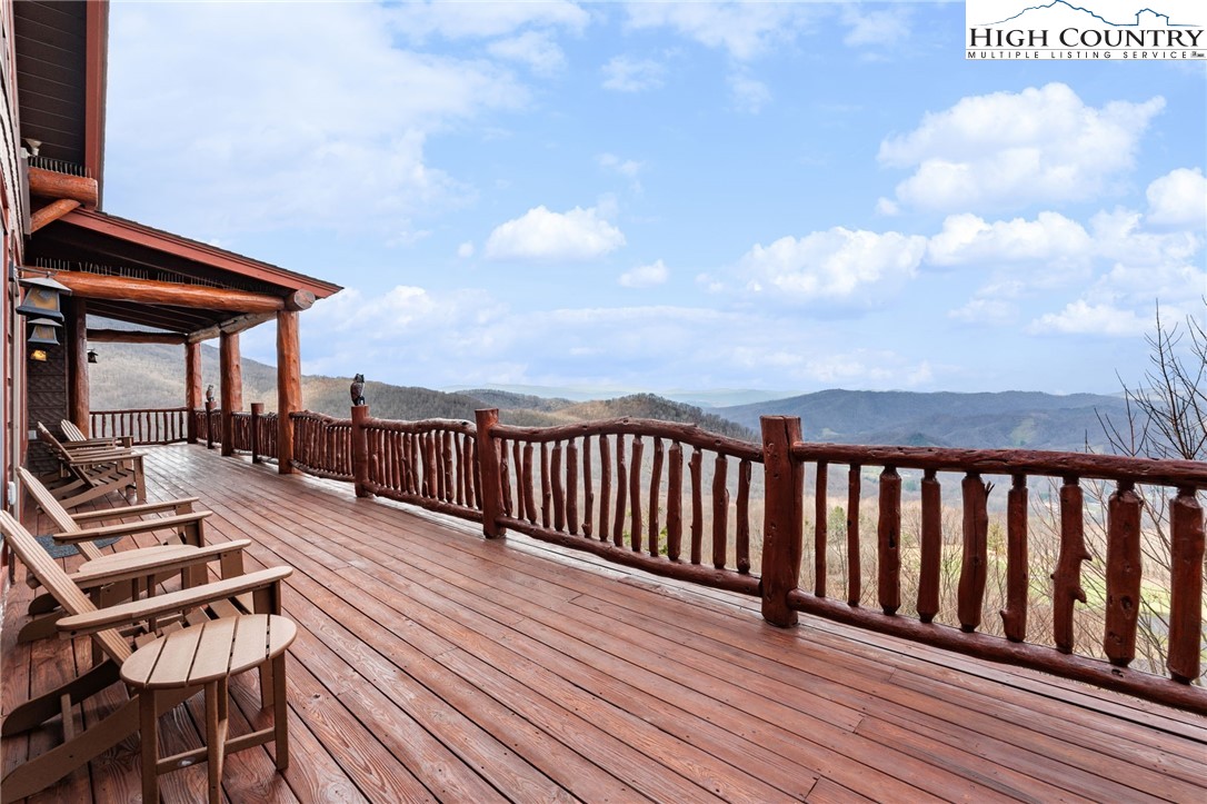635 Acorn Road Zionville, NC 28698 - Photo 4 of 50 a view of a balcony with wooden floor