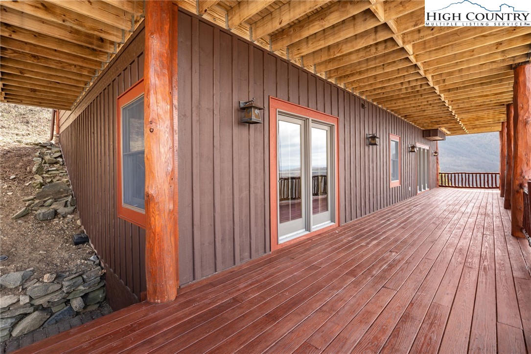 635 Acorn Road Zionville, NC 28698 - Photo 46 of 50 a view of backyard with a wooden deck