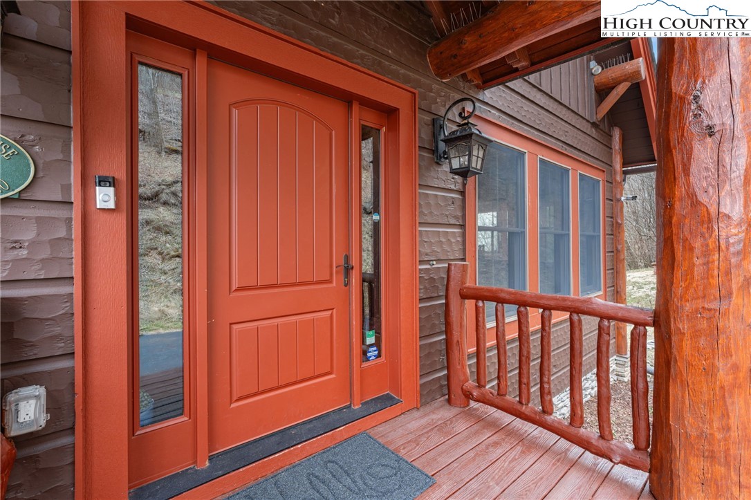 635 Acorn Road Zionville, NC 28698 - Photo 9 of 50 a view of a porch with wooden floor