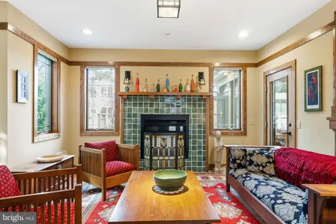 a stove top oven sitting inside of a kitchen