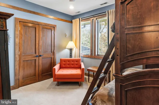 a kitchen with stainless steel appliances a sink and cabinets