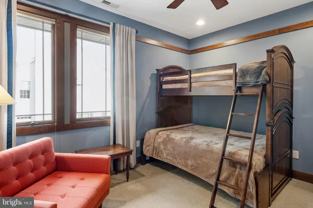 a bathroom with a granite countertop toilet sink and shower
