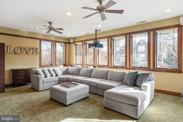 a view of a backyard with sitting area