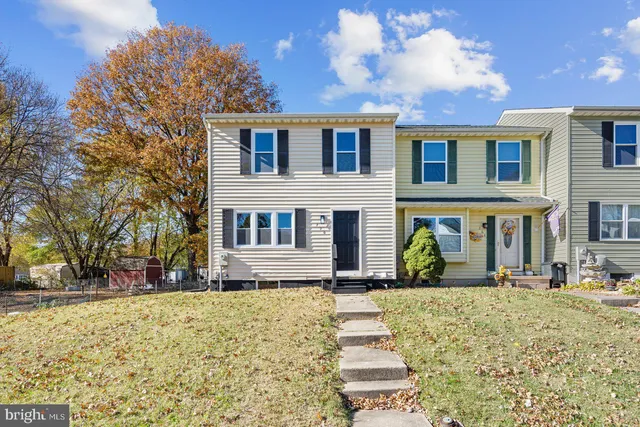 a front view of house with a yard