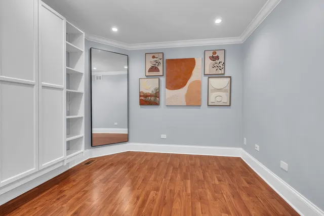 a view of a livingroom with wooden floor