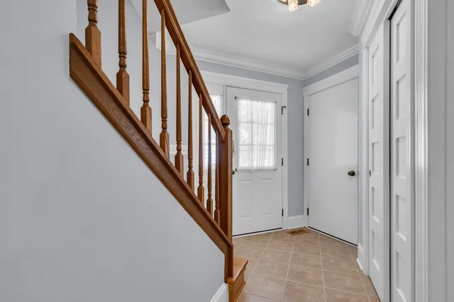 a view of an entryway with staircase