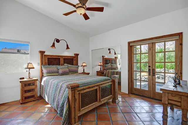 a kitchen view with a stove and a wooden floor