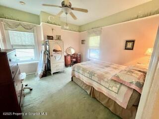1012 Sunset Street Scranton, PA 18509 - Photo 27 of 46 a spacious bedroom with a bed and a window