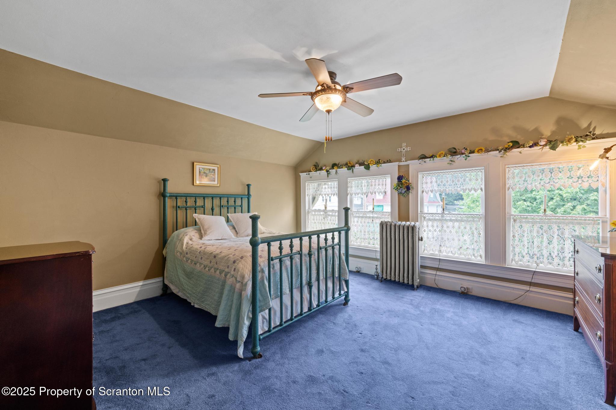 1012 Sunset Street Scranton, PA 18509 - Photo 29 of 46 a room with a bed and a large window
