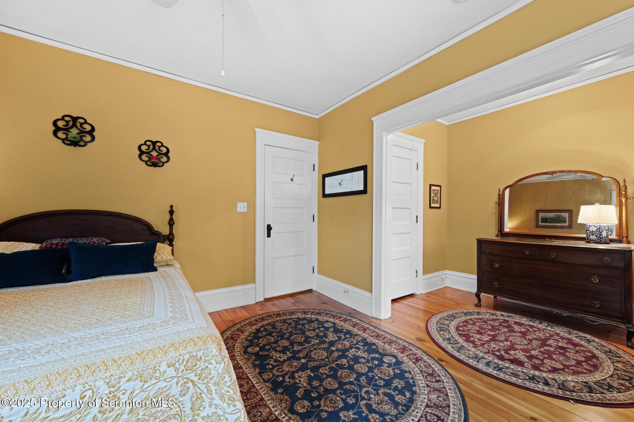1012 Sunset Street Scranton, PA 18509 - Photo 33 of 46 a bedroom with a bed and dresser