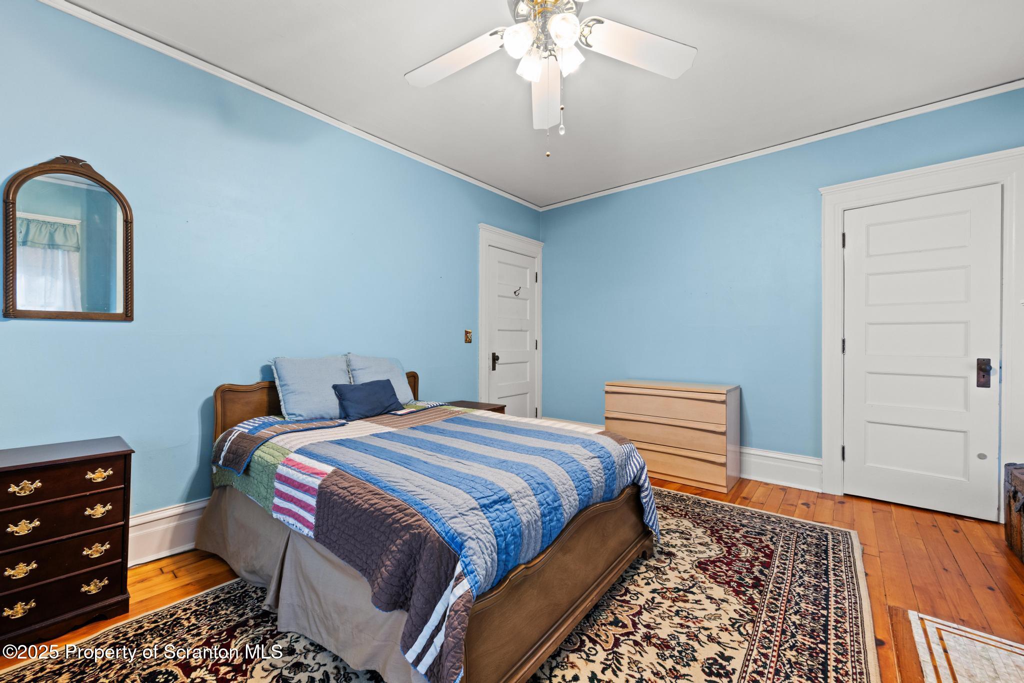 1012 Sunset Street Scranton, PA 18509 - Photo 35 of 46 a bedroom with bed and a window