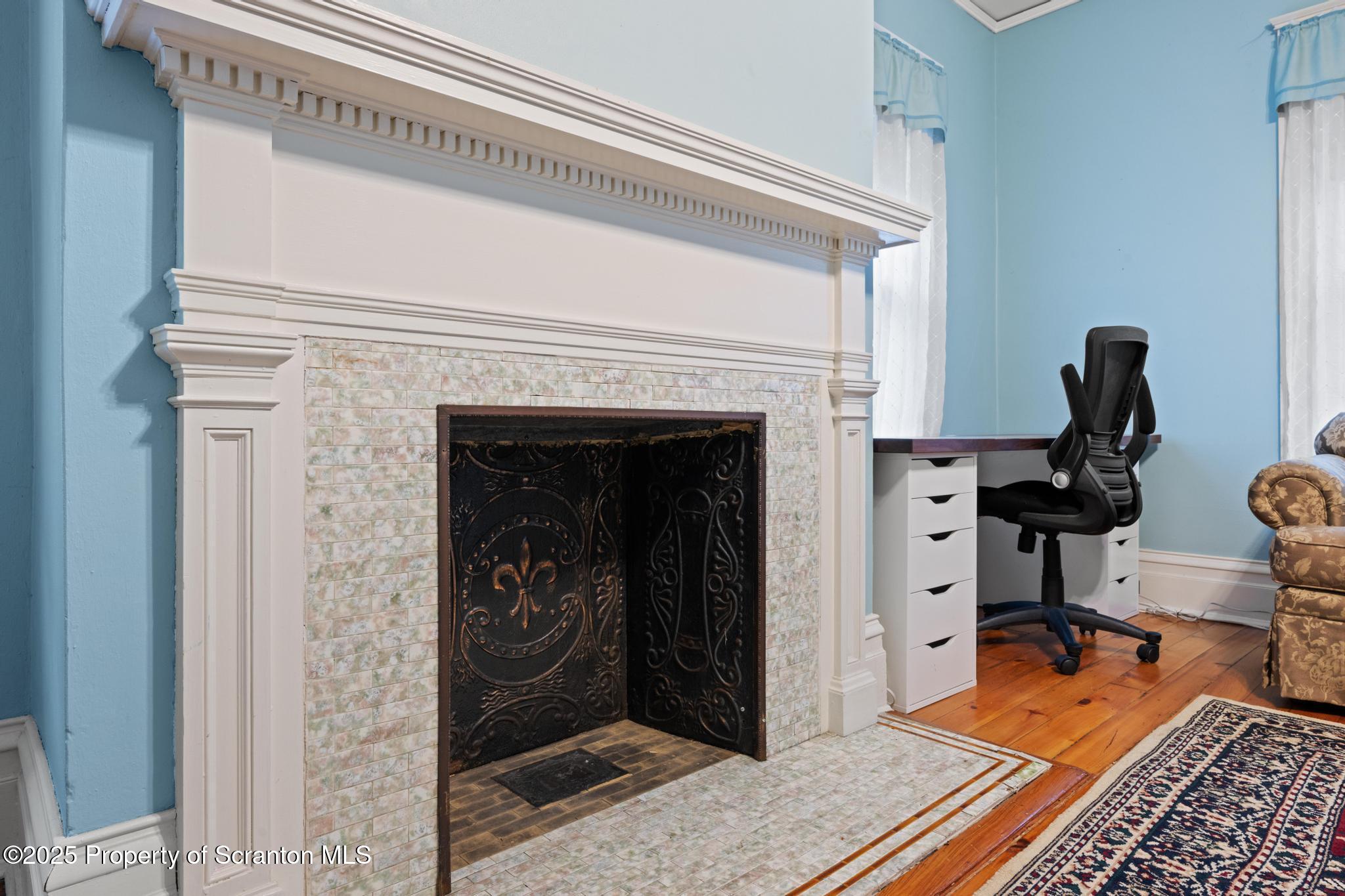 1012 Sunset Street Scranton, PA 18509 - Photo 36 of 46 a view of a livingroom with chair and front door
