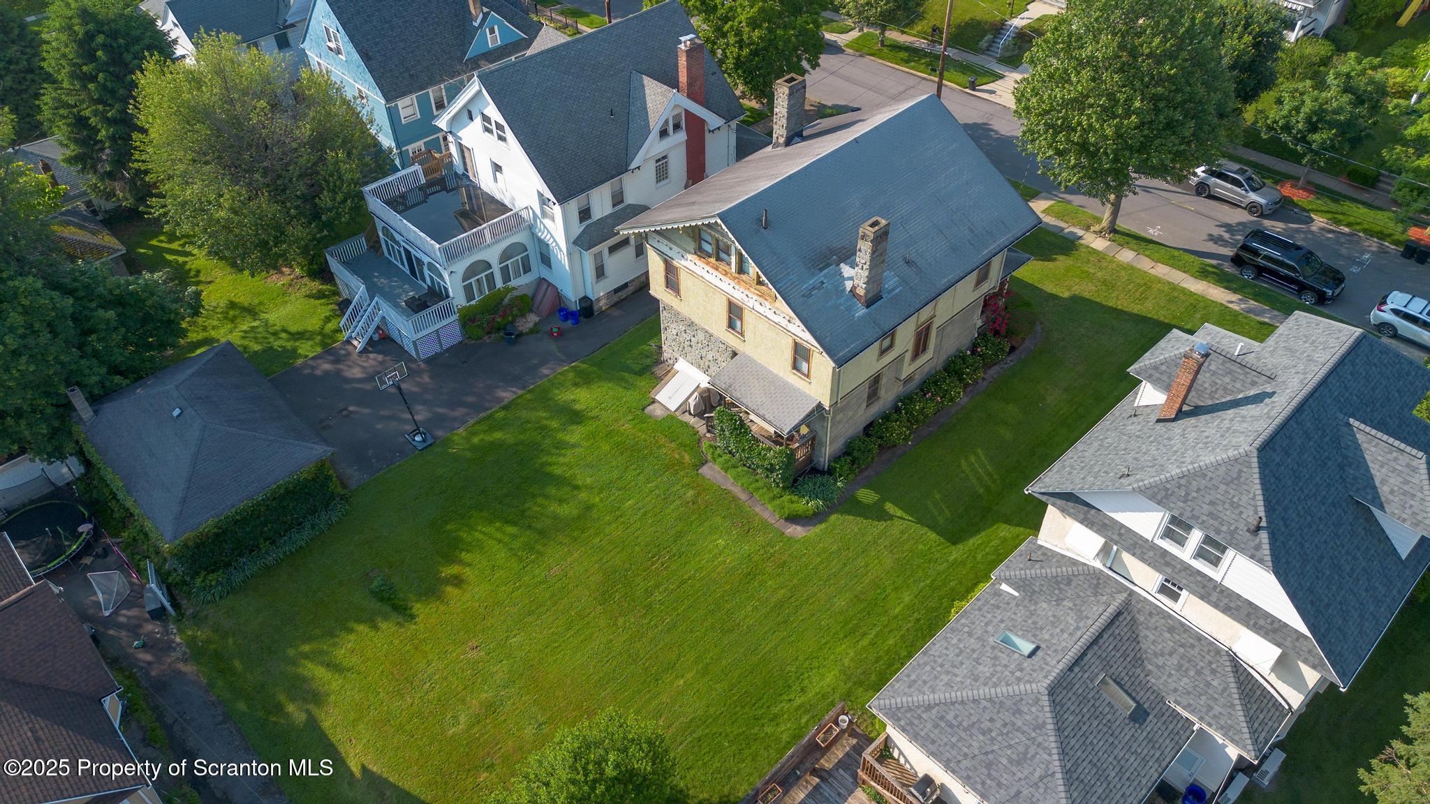1012 Sunset Street Scranton, PA 18509 - Photo 43 of 46 an aerial view of a house with a yard