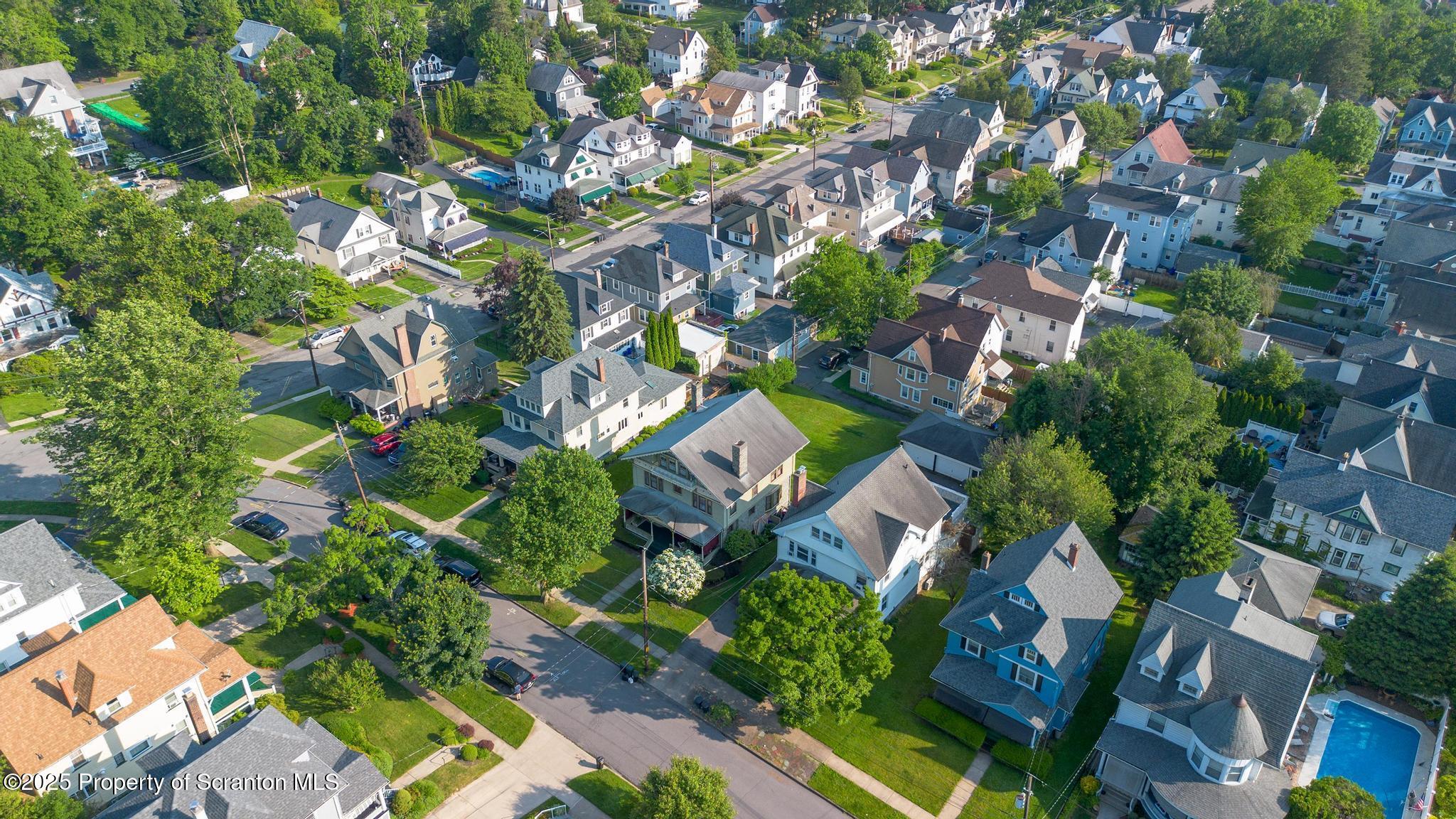 1012 Sunset Street Scranton, PA 18509 - Photo 45 of 46 an aerial view of residential houses with outdoor space and trees