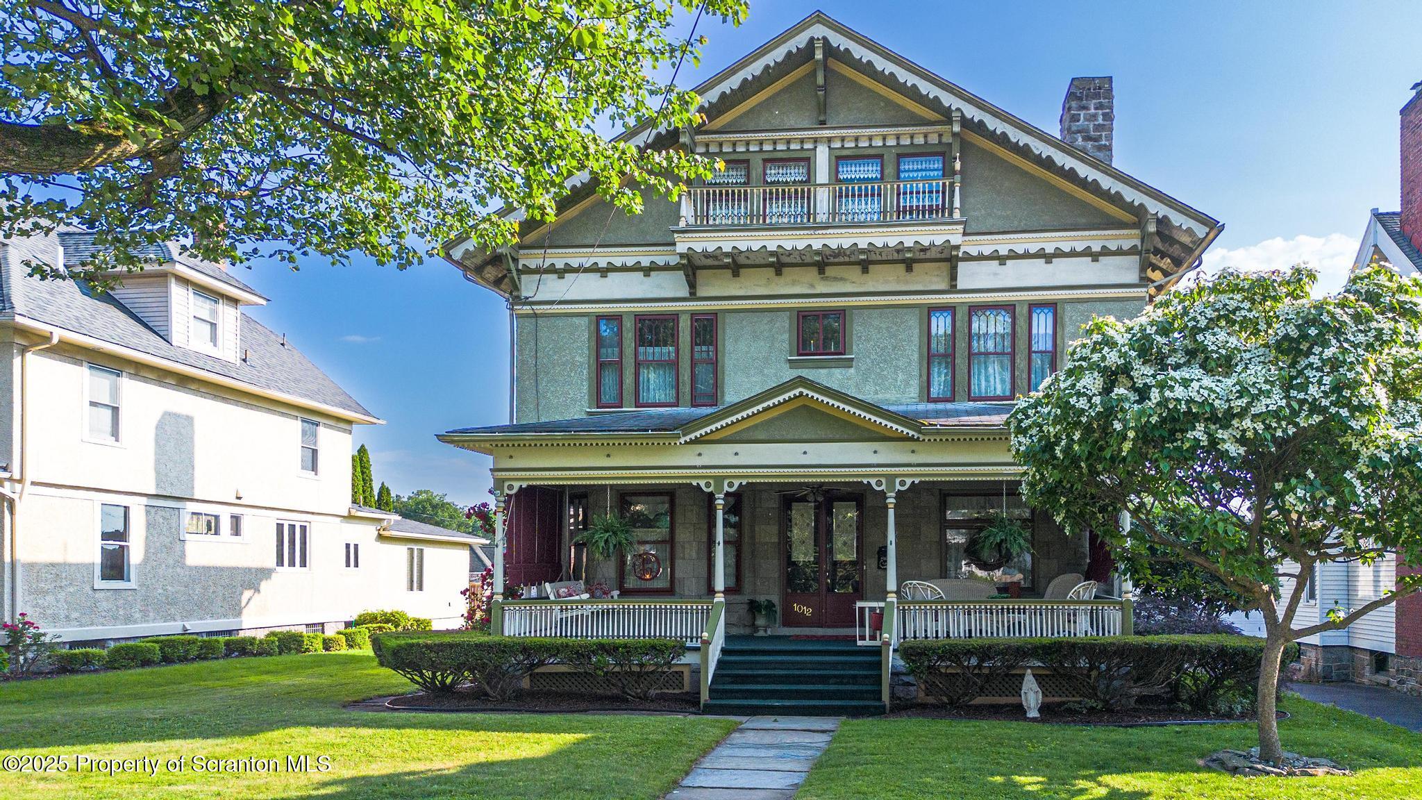 1012 Sunset Street Scranton, PA 18509 - Photo 46 of 46 a front view of a house with a yard