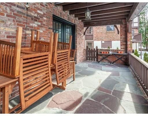 a view of living room filled with furniture and a porch